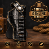 Black textured .32 bore pistol holster with snap button closure and belt clip